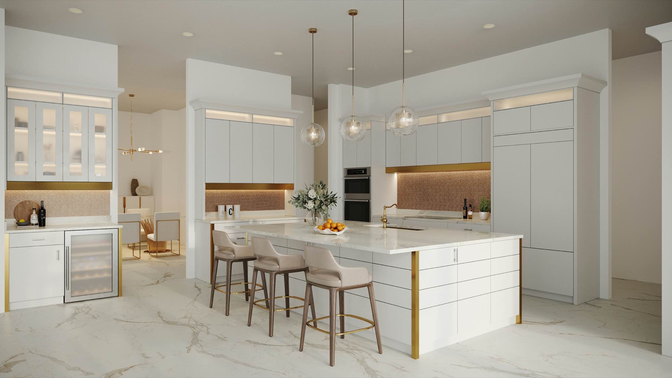 A white kitchen with brass pendant lights, a marble floor and a wide island